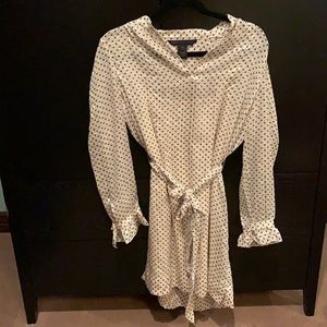 A white polka dot long shirt with belt